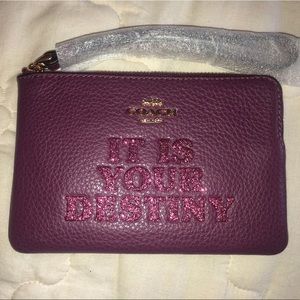 “It is your destiny” Coach wallet